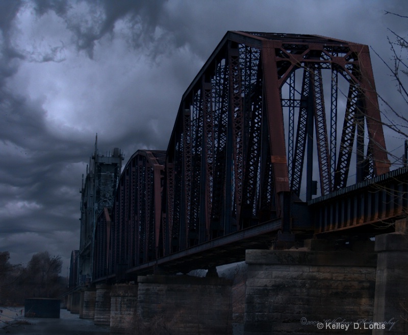 stormy railroad bridge