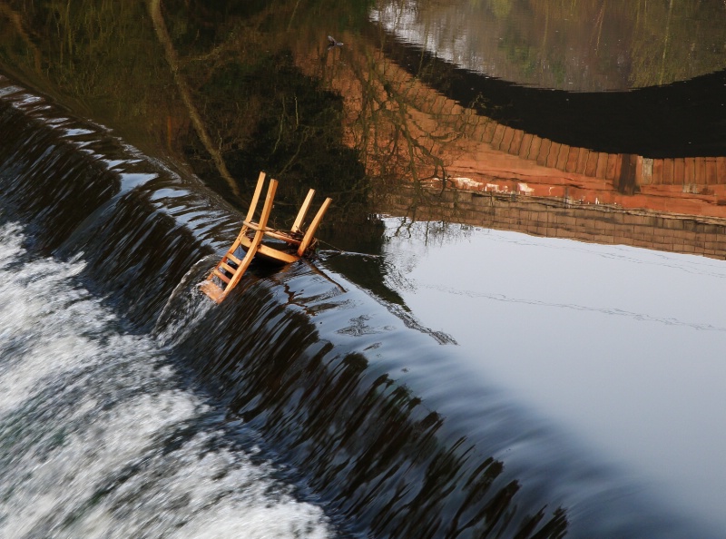 Water, reflections & a chair