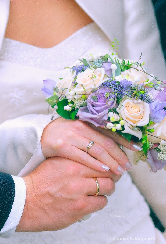 Wedding rings - and flowers.