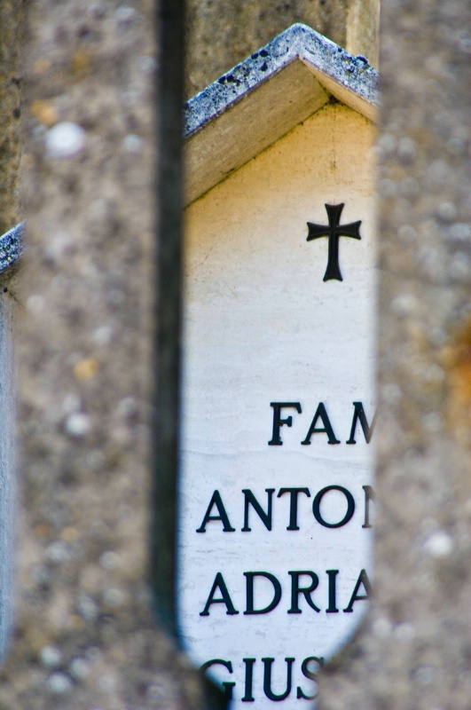 Grave Marker Through Fence, Todi, Umbria - ID: 8256239 © Larry J. Citra