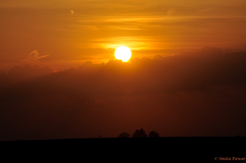 Sunset Behind Clouds