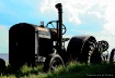 old tractor in fi...
