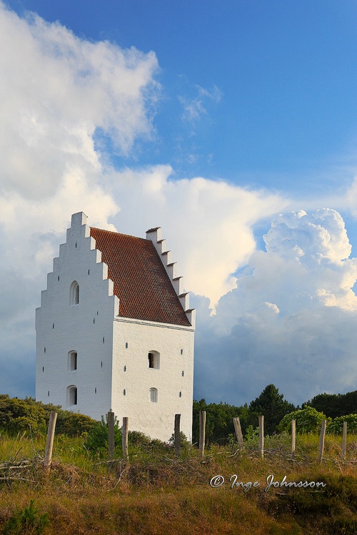 Clouds over "Den Tilsandene Kirke" (Denmar