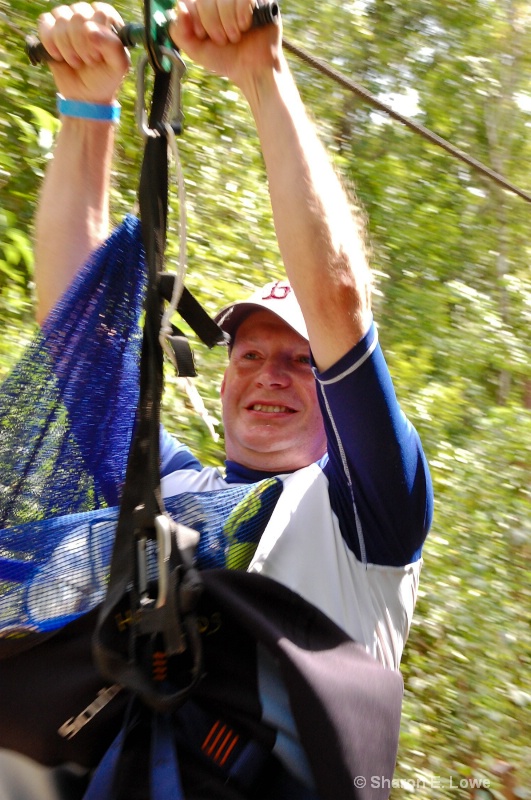 Ali on the zip line at Hidden Worlds - ID: 9052382 © Sharon E. Lowe