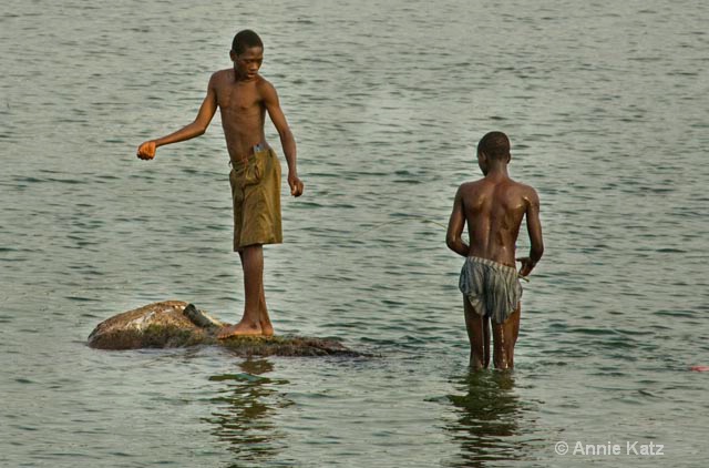 two young fishermen - ID: 9169446 © Annie Katz