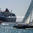 © Cheryl  A. Moseley PhotoID# 9175952: Queen Mary 2 w/sailboat