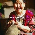 © Cheryl  A. Moseley PhotoID# 9183889: Eskimo Woman sewing animal skin into garment