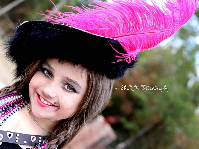 her~pink~feathered~pirate~hat