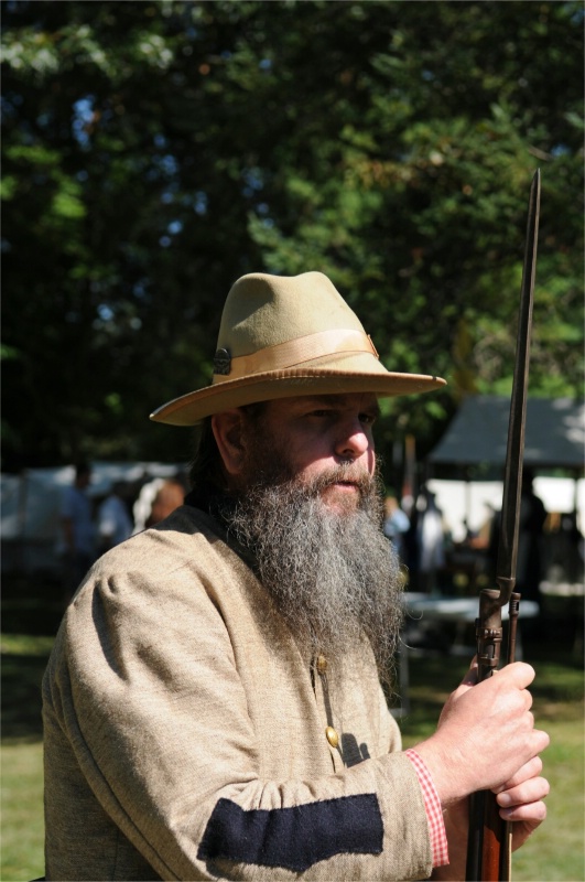 Confederate soldier armed and ready for battle 