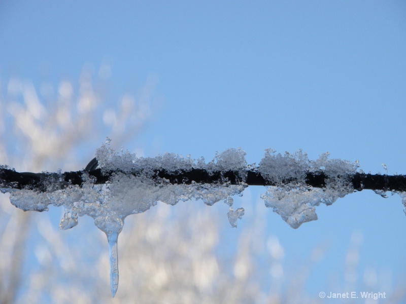 Ice on a wire
