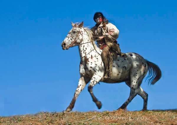 American Indian on Running Horse