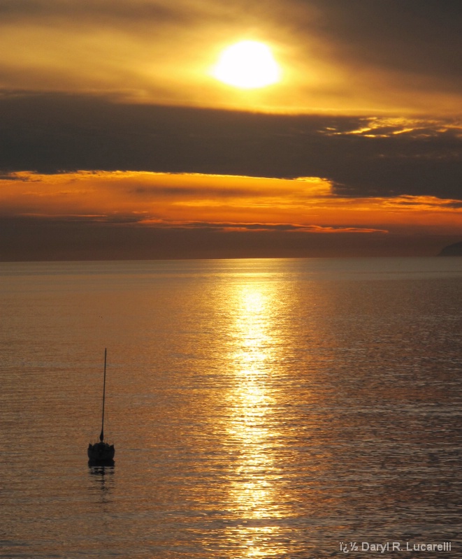 Laguan Beach Sunset w/Sailboat off Main Beach - ID: 9583852 © Daryl R. Lucarelli
