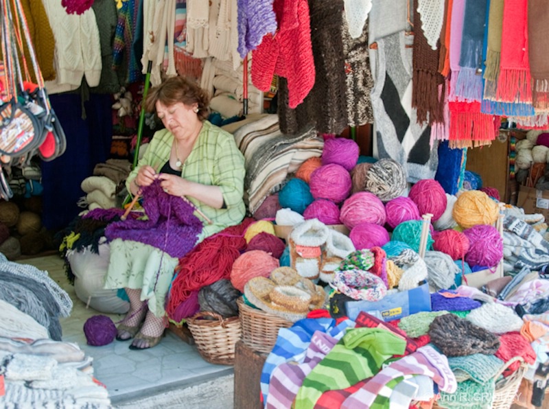Knitter with her production
