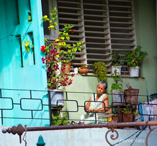 woman on balcony - ID: 9995304 © Annie Katz