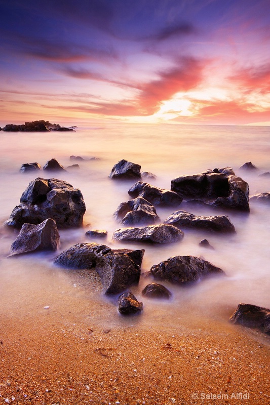 Sunset beach rocks