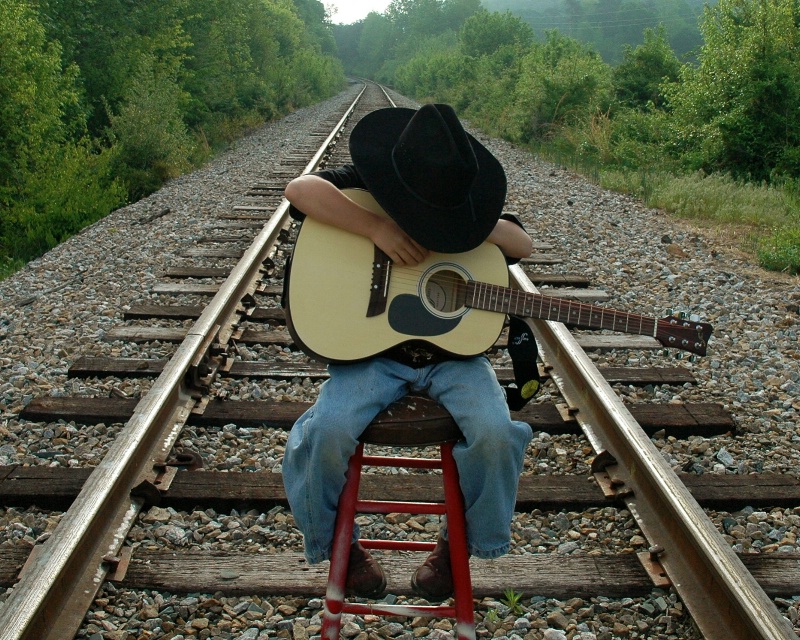 Cowboy and his guitar.