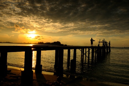 Early Angler at Old Jetty