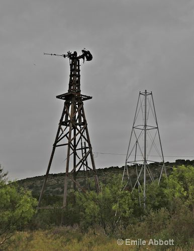 Twin broken windmills - ID: 10219962 © Emile Abbott
