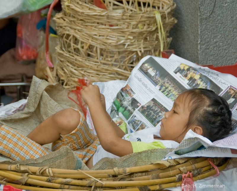 Basketful of Girl at Bangkok Flower Market - ID: 10318882 © Deb. Hayes Zimmerman