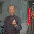 Chinese man and pipe in Beijing Hutong - ID: 10318887 © Deb. Hayes Zimmerman