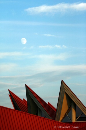 rising moon and roofline