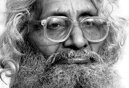 Bespectacled Sadhu.