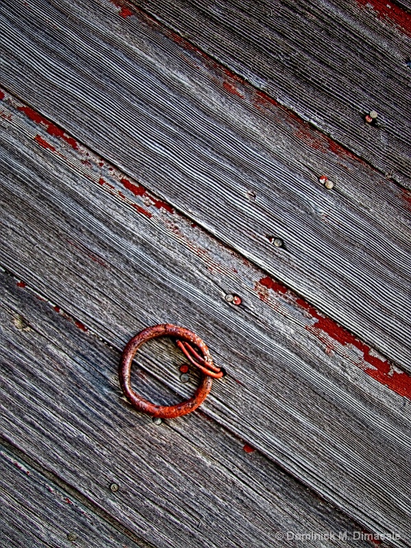 A SINGLE METAL RING IN THE WALL