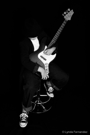 Cool Young Boy with Bass Guitar