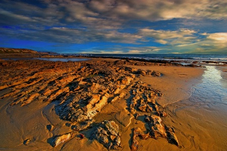 Of Golden Rocks and Sand