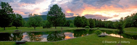 Bundy Center for the Arts reflecting pool at dusk