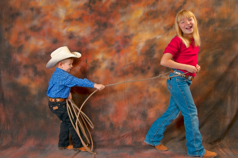 Cowboy roping sister