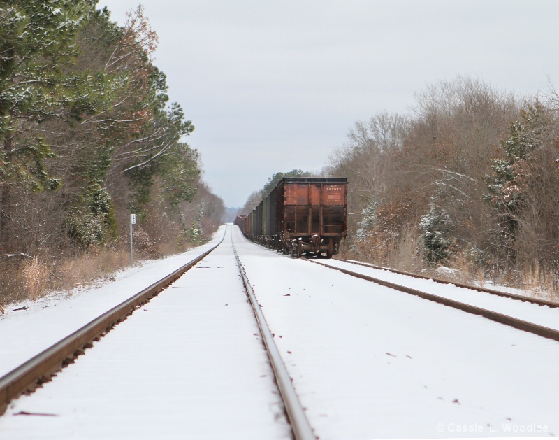 A Train, On The Tracks, With Snow