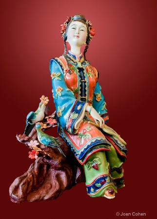 Chinese Figurine with Red