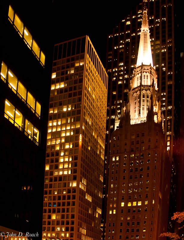 Steeple Among Skyscrapers - ID: 11660408 © John D. Roach