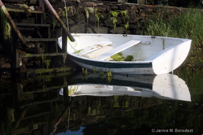 little white rowboat