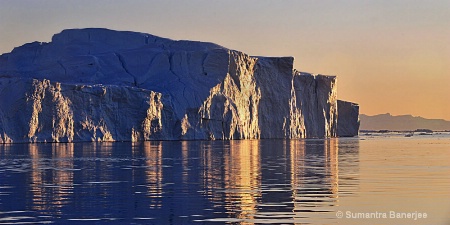 giant icebergs in the midnight sun  greenland