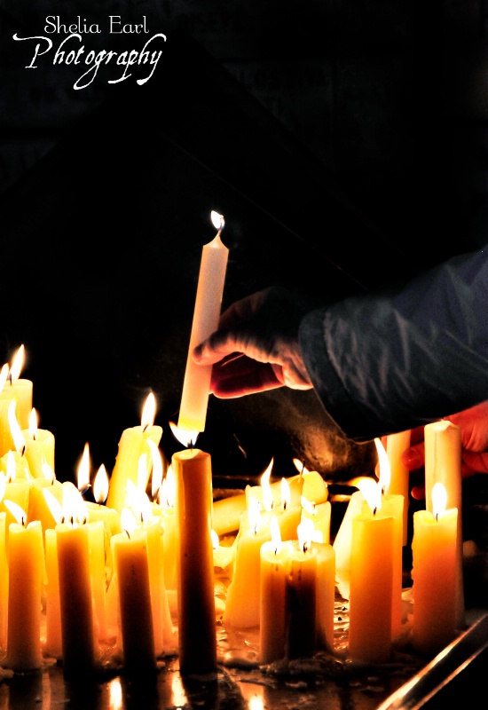 Lighting a Candle - ID: 12423079 © Shelia Earl