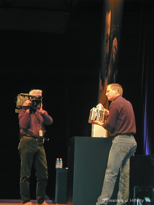 Steve Jobs holding "The Cube"