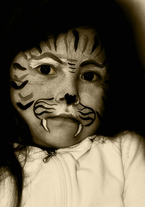 Little Girl With Tiger Face Paint - 2012