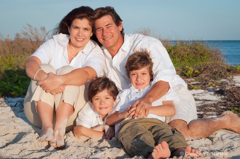 Happy family portrait on beach