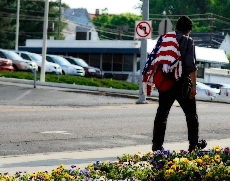 The Man with the Flag Jacket