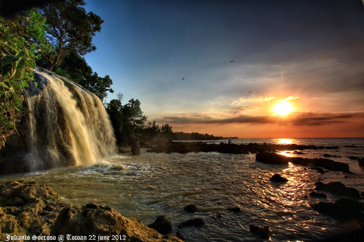 Toroan Waterfall  in sun set 