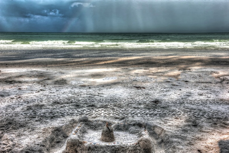 Sandcastles and Storm Clouds
