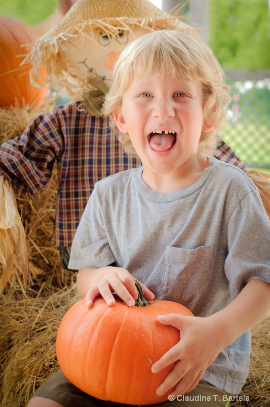 Happy with his pumpkin