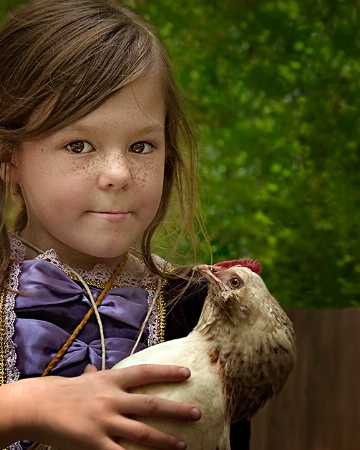 A Girl and Her Chicken