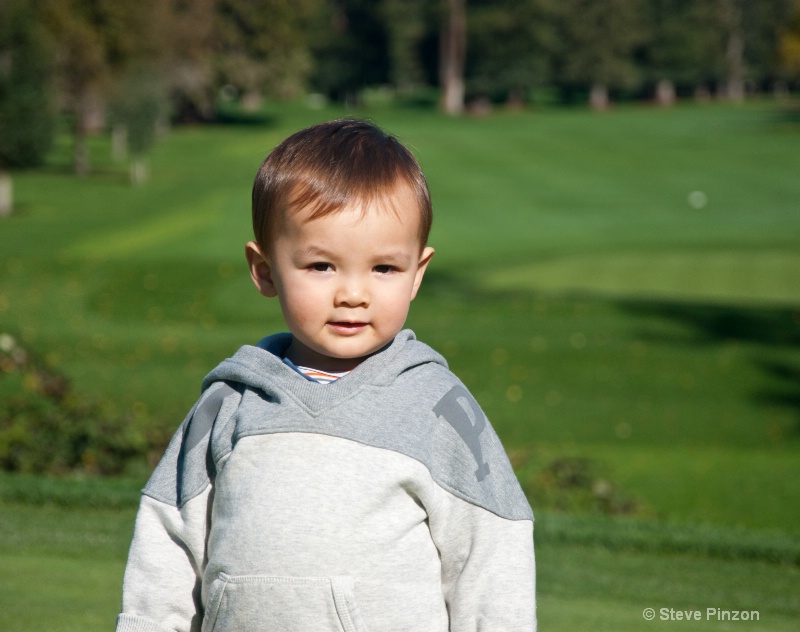 2 year old at the golf course
