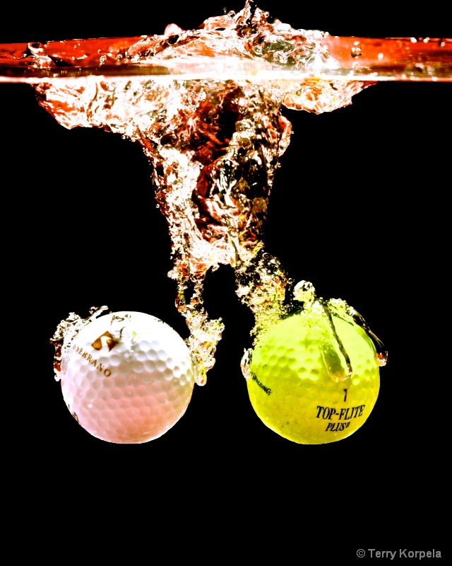 Golf Ball Splash - ID: 13580166 © Terry Korpela