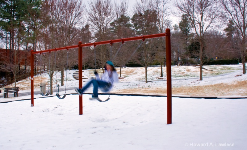 katie swinging in the snow