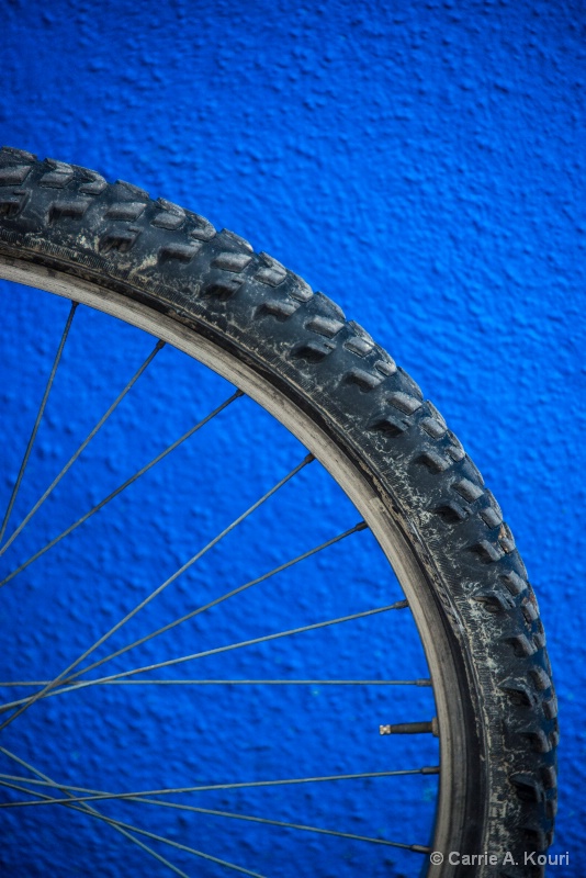 Bicycle Wheel against Blue Wall, Burano, Italy