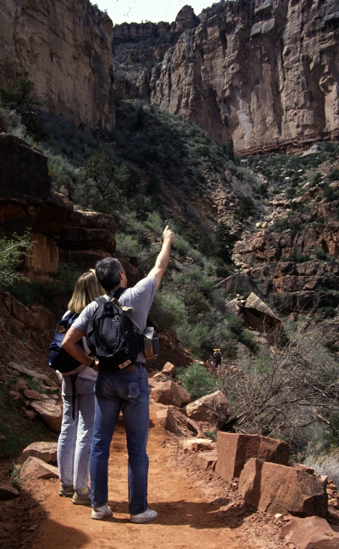 Couple hiking Grand Canyon NP, AZ